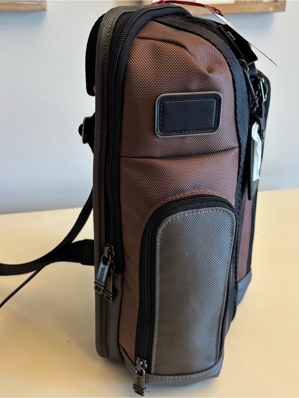 TUMI Higgins men’s sling pack black brown colorblock multi bag NEW - Picture 6 of 12